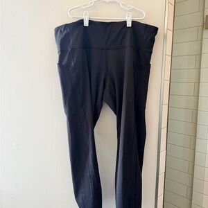 Athleta Black Ultimate Stash 7/8 Tights with Pockets